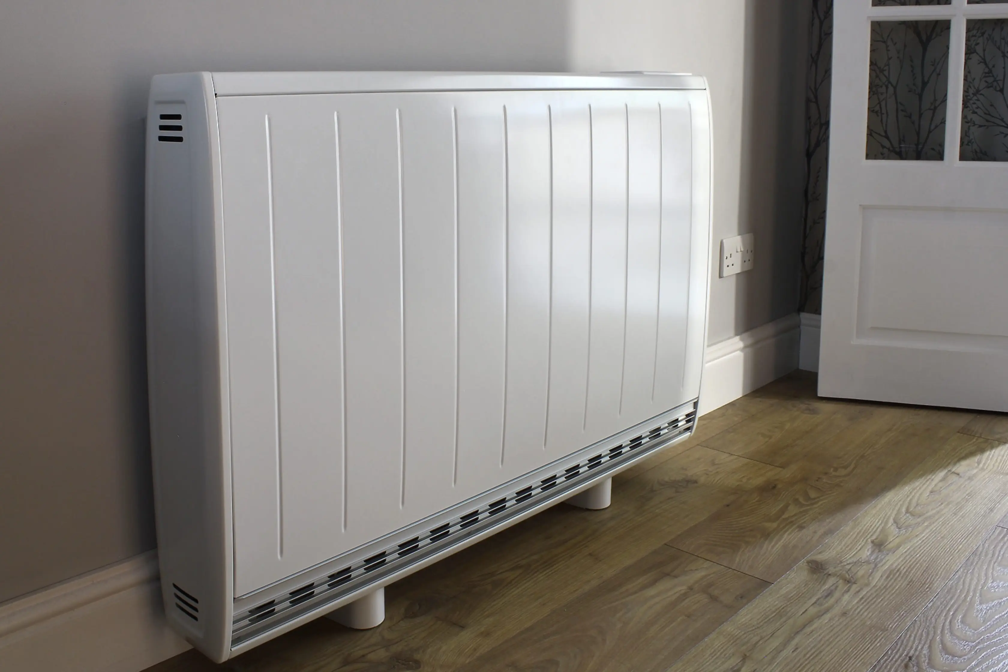 Flat Panel Storage Heater In Lounge